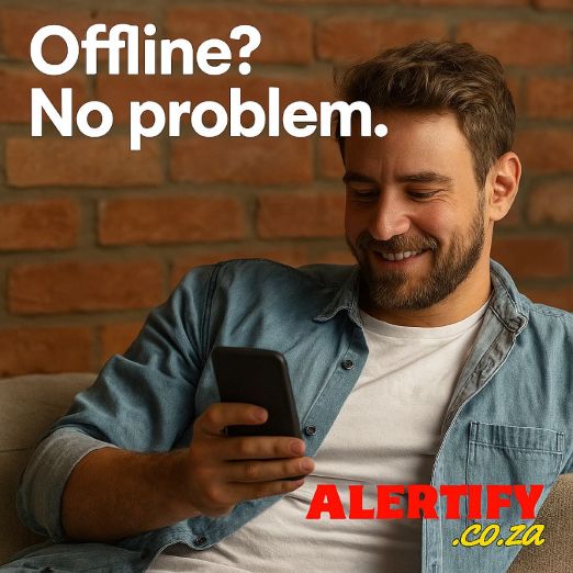 Image showing a man smiling at his phone